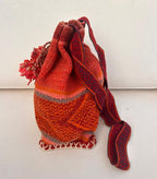 Woven backpack with a flower design