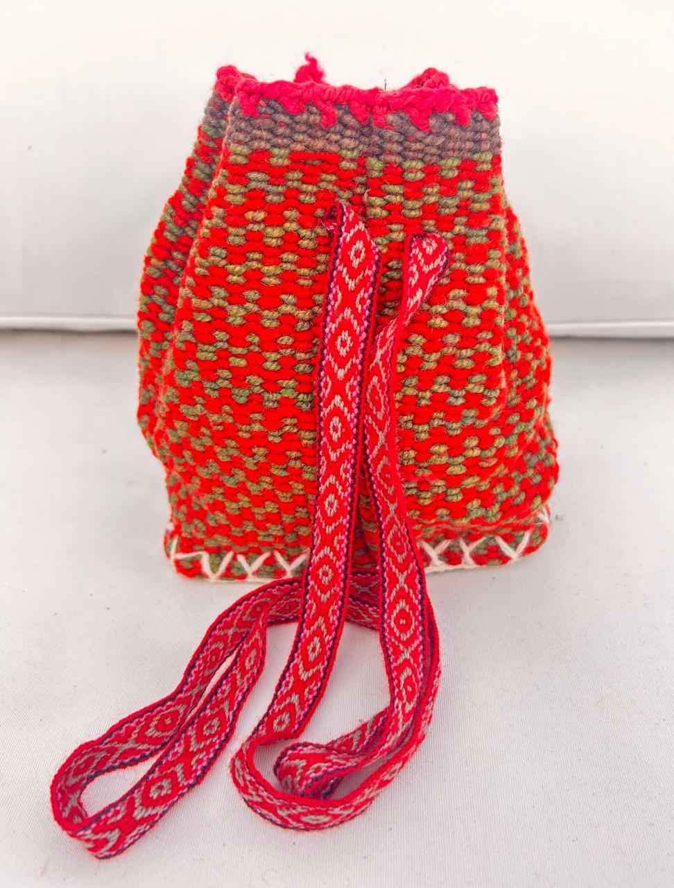 Small orange bag with patterns