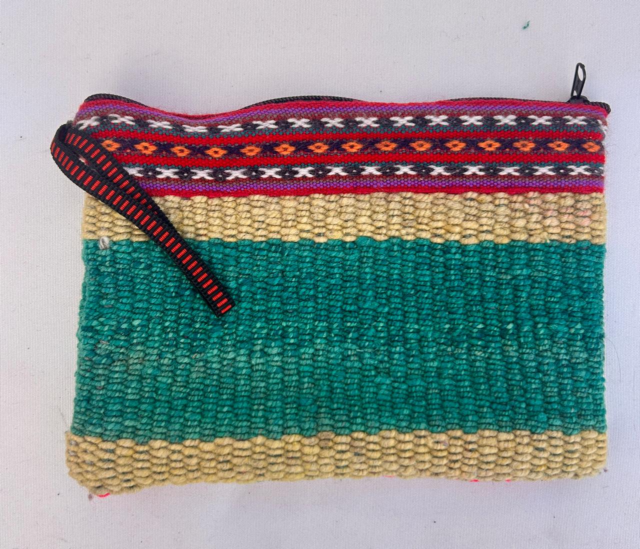 Turquoise knitted pencil case